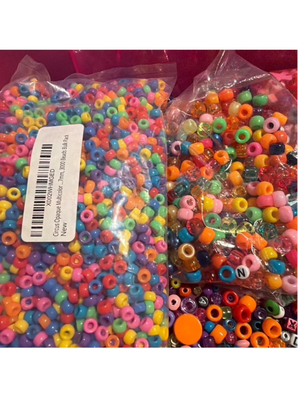 Extra large hot pink craft organizer With Multi-colored acrylic beads and charms